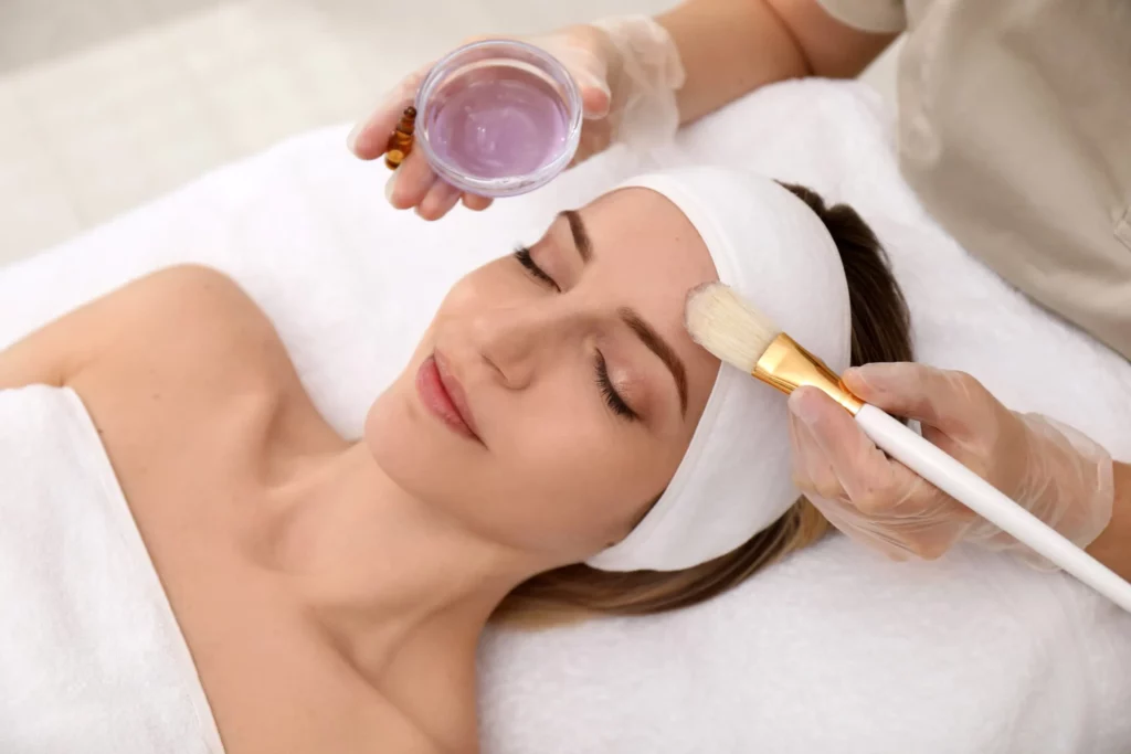 Girl getting Chemical Peel Facial Treatment | Nuyu Med Spa